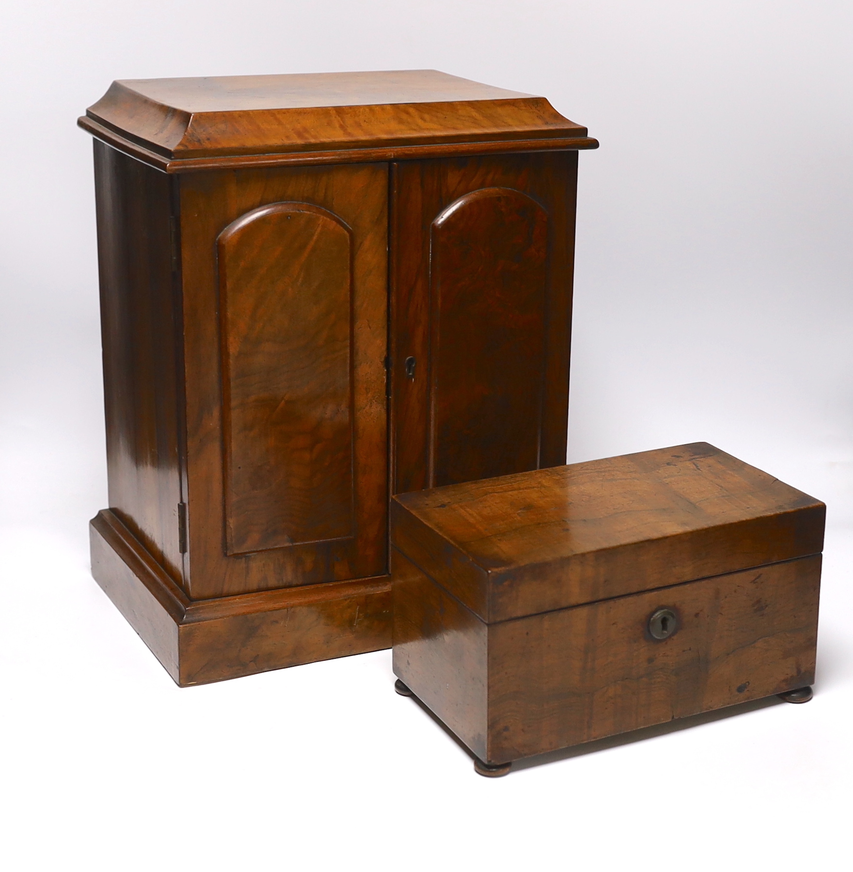 A small Victorian three drawer walnut cabinet, together with a mahogany tea caddy, cabinet 35.5cm x 30cm wide